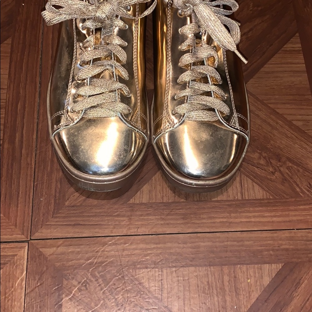 All over gold shoes.
